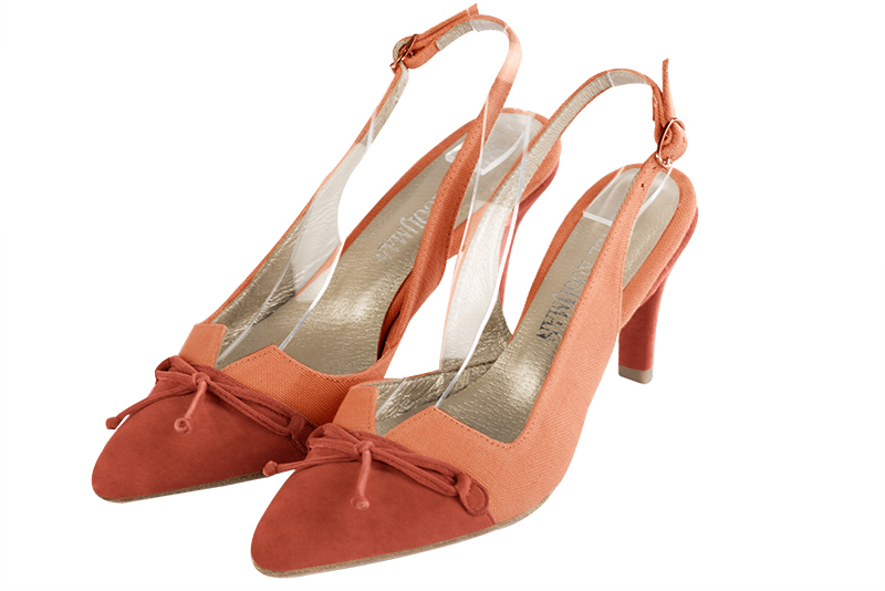 Terracotta orange women's open back shoes, with a knot. Tapered toe. Medium slim heel. Front view - Florence KOOIJMAN